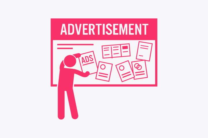 An image showing a man attach an advertisement