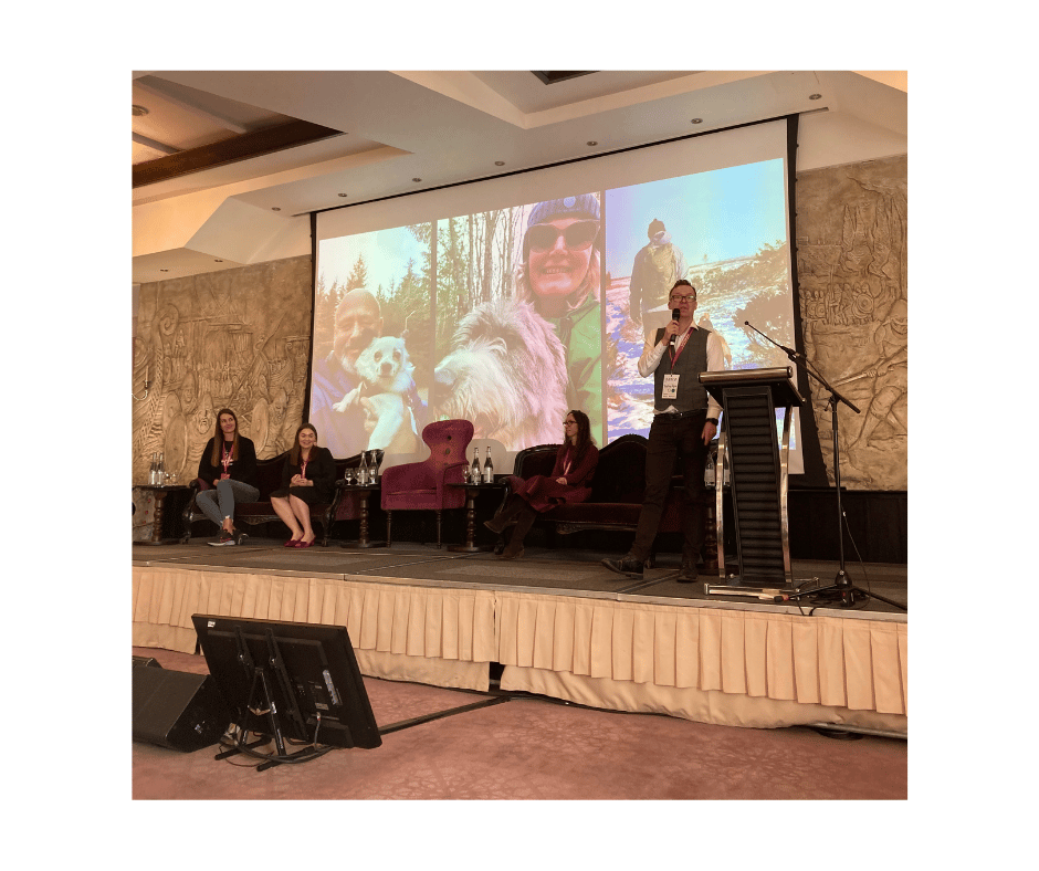 Photo of Marco Kuntze on stage during his session at the Social Fundraising Summit